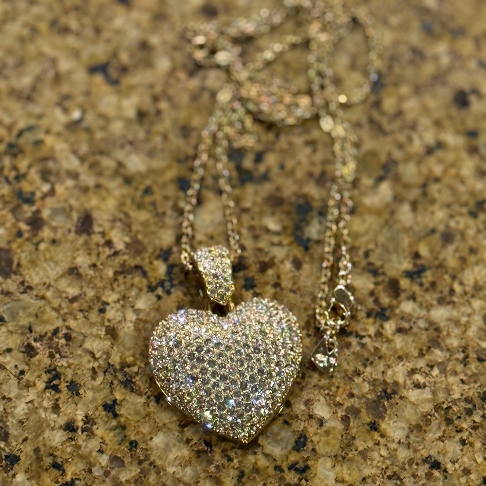Retired Swarovski Puffy Heart Swan Pave pendant necklace